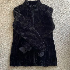 Beautiful and warm snow angel faux fur coat.